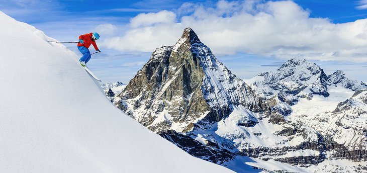 A scenic view of skiing in Switzerland during the winter months