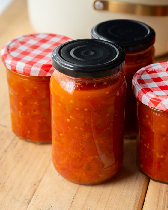 Fresh Ingredients Being Cooked To Create Tomato Sauce