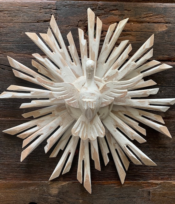 Local artisan crafting art from recycled waste at Espiritu Santo Island.