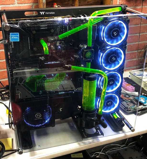 A Corsair CX650M power supply unit, presented in a professional product photo showcasing its modular design and features.