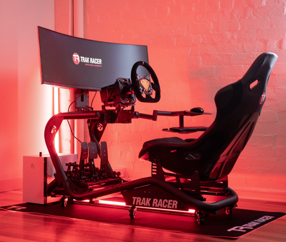 Screenshot from a sim racing game showing gameplay with an ultrawide monitor aspect ratio.