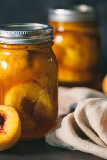 Canning peach sweet tea jars