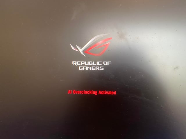 Flat-lay arrangement of all the PC components on a clean surface, arranged aesthetically with the tools needed for assembly, shot from directly above with even lighting.