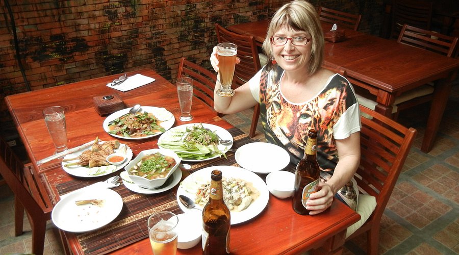 A close-up shot of a bowl of Khao Soi with visible ingredients.