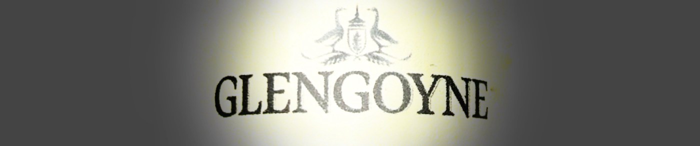 A group of people participate in a traditional Scottish Ceilidh, dancing and laughing in a village hall.