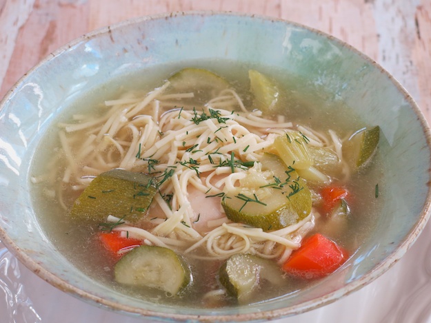 Hearty root vegetable soup served in a bowl