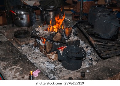 Close-up shot of a person's face in a dry suit, eyes closed, reflecting the surrounding ice and sky, with soft, diffused lighting.