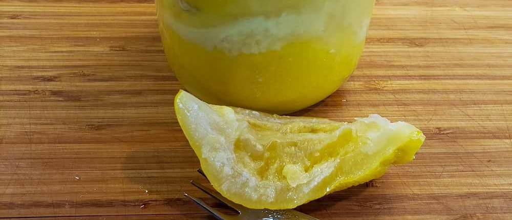 A close-up shot of preserved lemons.