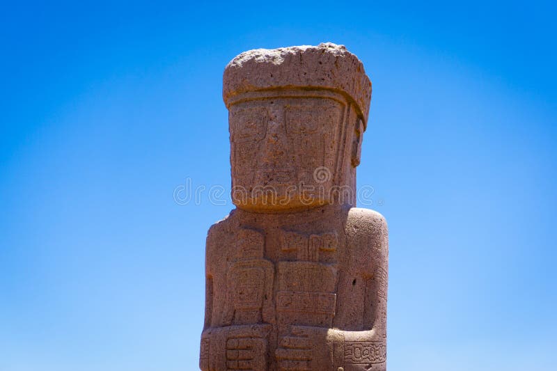 An illustration depicting workers transporting massive stone blocks at Puma Punku, using ropes and levers, set against the backdrop of the Andes Mountains.