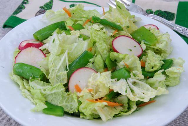 A vibrant photo of a freshly harvested salad bowl