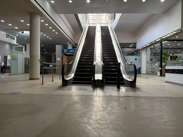 A Left 4 Dead 2 smoker lurking in the shadows of the Terminal map, ready to ambush unsuspecting survivors.