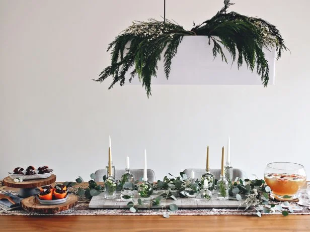 Yule log adorned evergreen pinecone berries