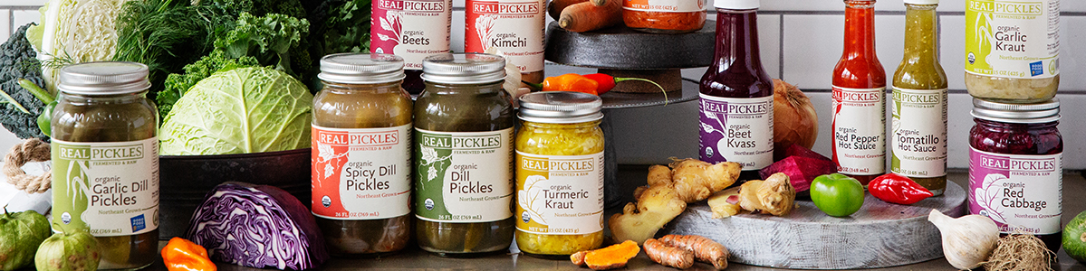 Brightly colored pickled vegetables arranged artfully