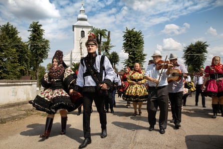 A craft fair in Sibiu featuring hand-carved wooden items and traditional pottery.