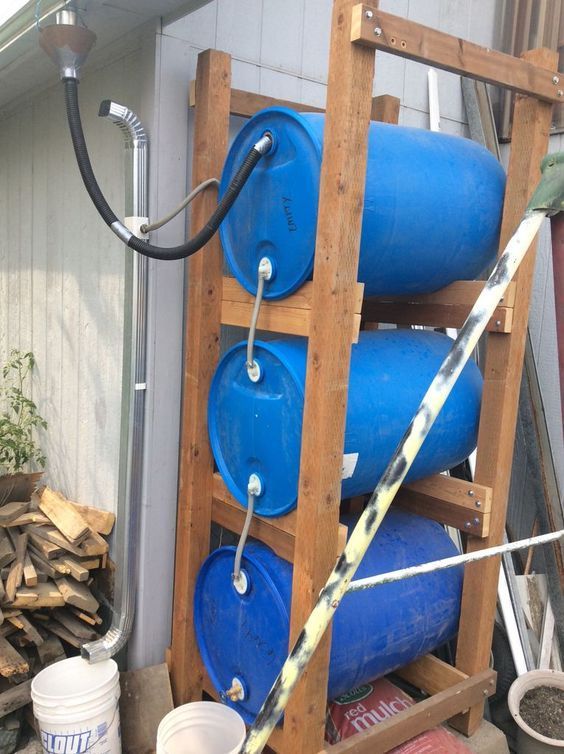 Close-up image of a spigot being installed on a rain barrel.
