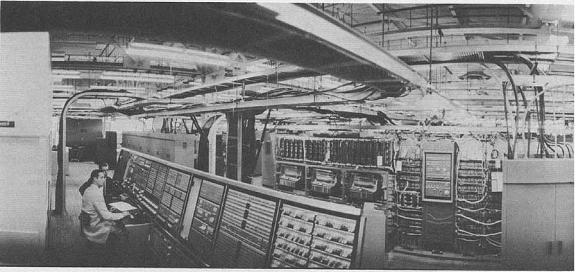 Naval officers studying radar data