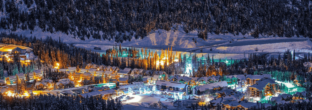 Skiing at Lake Louise with turquoise water visible