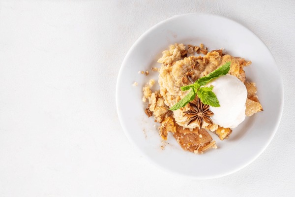 Rustic Spiced Pear and Almond Crumble with Toas...