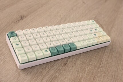 Close-up shot of the Noctua NH-L9a-AM4 CPU cooler installed on the CPU, showcasing its low-profile design.