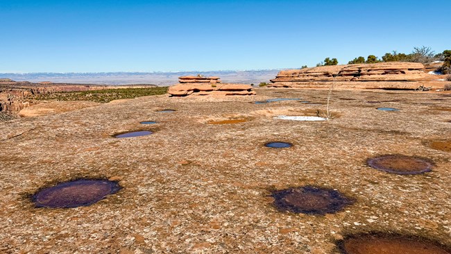 A side-by-side comparison showcasing the improved environmental details and lighting in Black Mesa Definitive Edition compared to the original release.