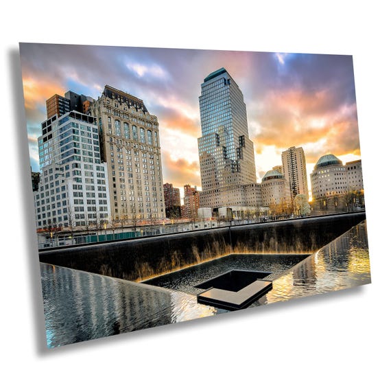 A tactical mission screenshot depicting a tense firefight in a ruined cityscape, emphasizing the environmental destruction and increased enemy presence compared to the base game.