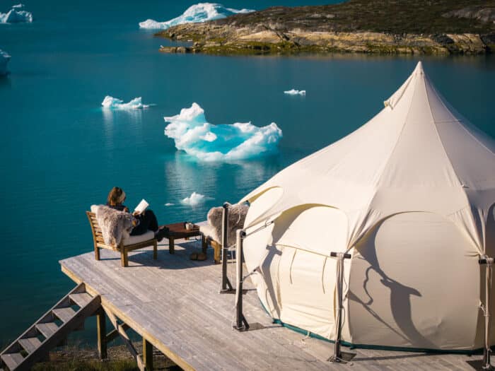 Iconic shot of McWay Falls cascading onto the beach from the viewing platform in Julia Pfeiffer Burns State Park.