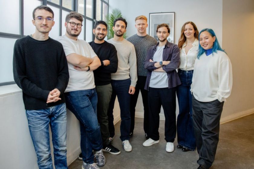 A professionally styled photo of the workspace in the Studio Suite, focusing on the desk, ergonomic chair, and ample natural light. Caption: