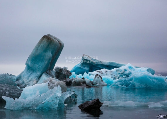 Face Rock at Bandon Beach, Oregon, illuminated with light painting at night.
