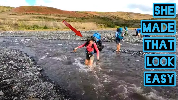 A climber navigating a Via Ferrata with exposed sections in the Dolomites.