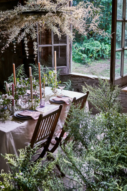 farmhouse table setting wild greens centerpiece