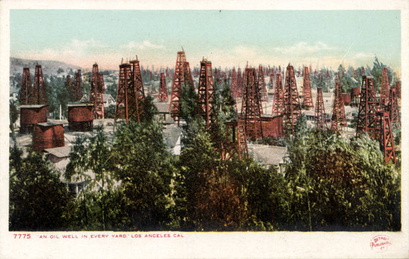 A vintage photo of an oil well in Los Angeles, illustrating that even with industrial advancement, the need for sustainable food storage such as a root cellar remains important