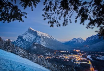 Shuttle bus travelling through the snowy Canadian Rockies