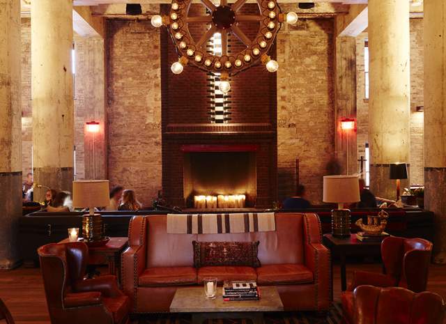 The hotel Emma courtyard and tower at night