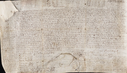 The cozy and inviting atmosphere of the Writer's Bar at the Pulitzer Amsterdam, complete with a wide selection of whiskeys, cognacs, and Jenever.