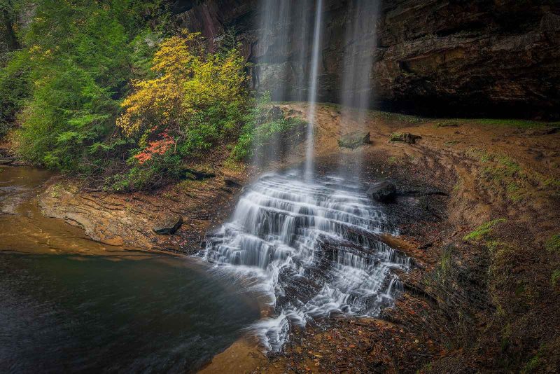 McWay Falls cascading onto the beach