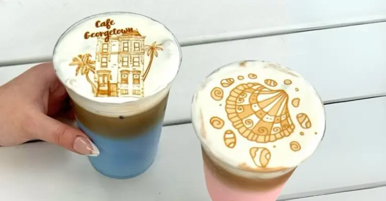 A customer showing a cold brew coffee to the camera