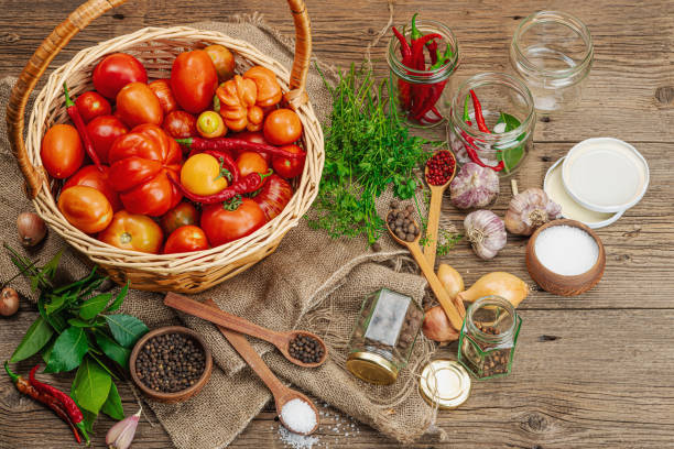 Preserved season vegetable concept harvest of tomato chili greens onion and garlic