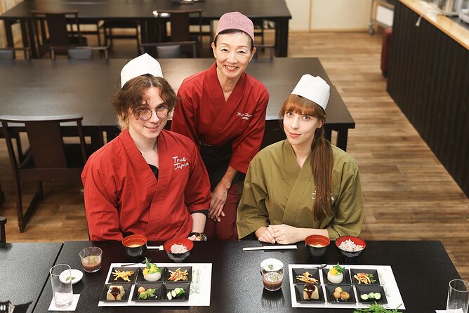 An intricately plated dish of Shojin Ryori at Shigetsu restaurant, showcasing the artful arrangement of vegetables and tofu. The tranquil ambiance of the restaurant is visible in the background.