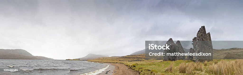 Image of the Old Man of Storr at sunset with dramatic lighting and atmospheric conditions.