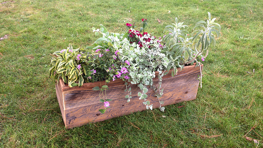 Landscape fabric lining inside of a raised bed