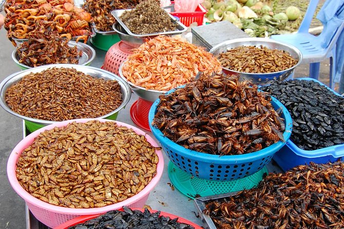 Mrs. Srey Serving Deep Fried Tarantulas at Angkor Night Market