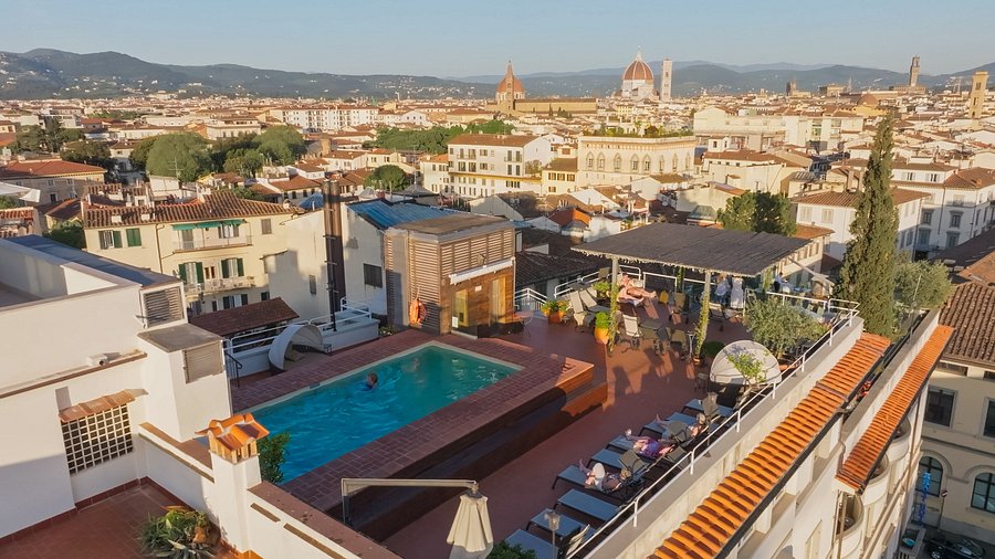 A beautiful Tuscan landscape with rolling hills and vineyards
