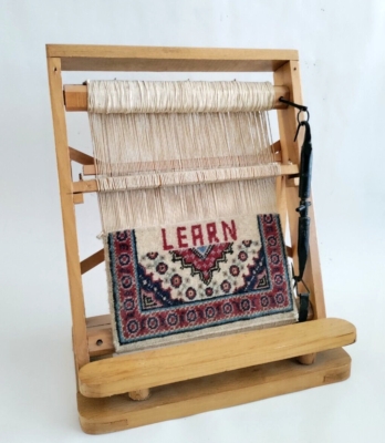 A Maldivian artisan carefully weaving recycled plastic into a vibrant tote bag under golden hour lighting, showcasing the transformation of waste into treasure
