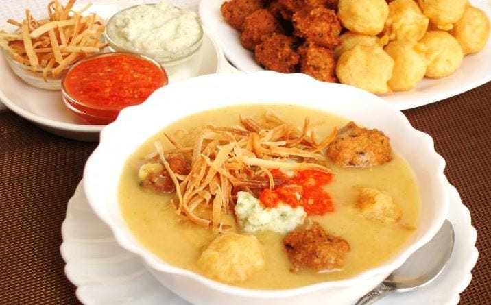 Street Vendor Preparing Urojo Soup