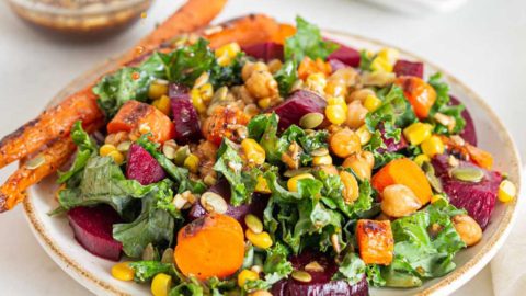 A beautifully plated salad with the homemade dressing