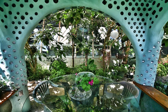 Atacama Desert Sunset: A vast, terracotta landscape with distant volcanoes painted in hues of ochre and crimson under the setting sun, capturing the essence of the desert's beauty.