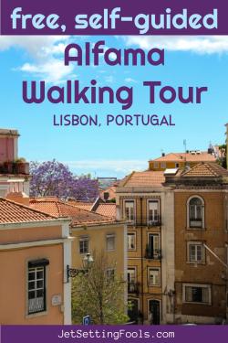 Cais do Sodré's vibrant Pink Street at night, filled with people and illuminated with colorful lights