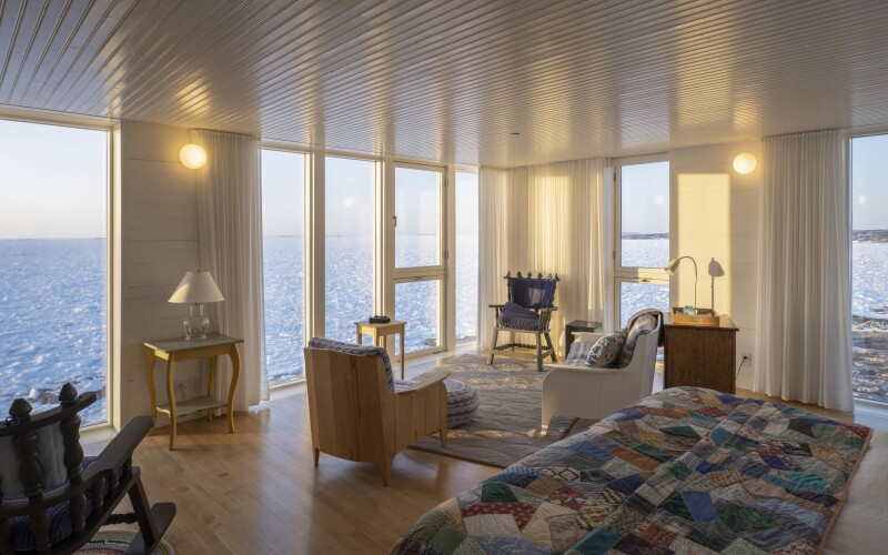 Interior shot featuring the hand-made quilts and traditional woodworking