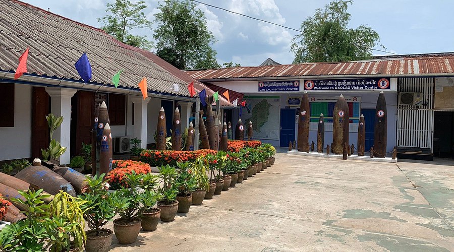 A black and white portrait of a Mekong River boatman, highlighting the weathered lines of his face