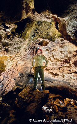 Javier using his Dobsonian telescope for stargazing at Colorado Bend State Park